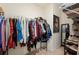 Organized walk-in closet with ample hanging space for clothing and accessories at 5616 Siltstone St, Lakeland, FL 33811