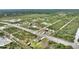 An aerial view illustrating the property's location and layout in its neighborhood at 2021 Valencia Dr, Indian Lake Estates, FL 33855