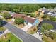Aerial view of the property showing the house, surrounding landscape and neighborhood at 3055 Steeplechase Dr, Lakeland, FL 33811