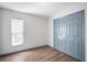 Bedroom featuring a closet and a bright window at 3055 Steeplechase Dr, Lakeland, FL 33811