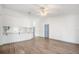 Open living area with wood floors and a breakfast bar, great for entertaining at 3055 Steeplechase Dr, Lakeland, FL 33811