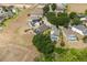 Aerial view of homes with screened pools in a residential neighborhood at 547 Windsor Pl, Davenport, FL 33896