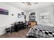 Bedroom showcasing racing decor, ceiling fan, and plenty of storage at 547 Windsor Pl, Davenport, FL 33896