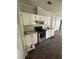 A kitchen featuring stainless steel appliances, a tiled backsplash, and plenty of cabinet space at 4266 County Road 691, Webster, FL 33597