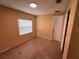 Sunny bedroom with a window and built in closet and neutral walls at 206 W 9Th St, Lakeland, FL 33805