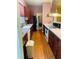 Well-equipped kitchen featuring sleek countertops, matching appliances, and hardwood floors for a practical cooking space at 208 Shepard Ave, Dundee, FL 33838