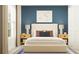 Cozy bedroom featuring neutral tones, minimalist art, and stylish bedside tables for a relaxing retreat at 2103 Forage Dr, Kissimmee, FL 34746