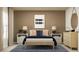 Inviting bedroom with a cozy bed, stylish nightstands, and an eye-catching accent wall at 2103 Forage Dr, Kissimmee, FL 34746