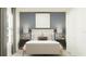 Comfortable main bedroom features a cozy bed, soft lighting, and calming color scheme at 2109 Forage Dr, Kissimmee, FL 34746