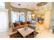 Open-concept living area with seamless flow to kitchen and breakfast nook at 2660 Wyndsor Oaks Way, Winter Haven, FL 33884