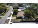 Overhead view of a single-Gathering home with a well-kept lawn and mature trees in a quiet residential neighborhood at 2920 Sanka Dr, Orlando, FL 32826