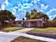 Charming one-story home featuring a covered front porch, well-maintained lawn, and an inviting curb appeal at 2920 Sanka Dr, Orlando, FL 32826