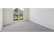 Comfortable bedroom featuring a large window for ample natural light at 1046 Island Pointe Dr, Winter Garden, FL 34787