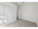 Neutral bedroom with closet, doorway, and soft carpet at 1046 Island Pointe Dr, Winter Garden, FL 34787