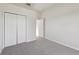 Neutral bedroom with closet, doorway, and soft carpet at 1046 Island Pointe Dr, Winter Garden, FL 34787