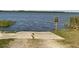 Private community boat ramp offering convenient water access, marked with 'Private Property' signage at 1415 Colonial Ct, Winter Haven, FL 33884