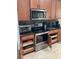 Kitchen appliances featuring stainless steel stove, oven, and microwave, with cabinet storage at 1415 Colonial Ct, Winter Haven, FL 33884