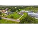 Aerial view of the home highlighting the neighborhood and landscaping at 8804 Harrison Rd, Lakeland, FL 33810