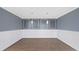 Dining room features decorative wall paneling and modern pendant lighting at 8804 Harrison Rd, Lakeland, FL 33810