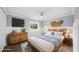 Well-appointed main bedroom features stylish decor and ample natural light at 8804 Harrison Rd, Lakeland, FL 33810