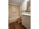 Bathroom featuring a vanity with drawers, a toilet, and a shower-tub combo at 11407 Bobwhite Blvd, Leesburg, FL 34788