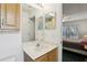 Well lit full bathroom featuring vanity with a view into bedroom at 30653 Pga Dr, Sorrento, FL 32776