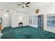 Bright and airy living room with sliders to an outdoor space at 30653 Pga Dr, Sorrento, FL 32776