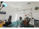 Functional office space with shelving, desk, chair, and ample natural light at 30653 Pga Dr, Sorrento, FL 32776