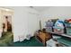 This storage room features well-organized storage with labeled boxes and shelving at 30653 Pga Dr, Sorrento, FL 32776