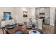 Eat-in kitchen featuring gray cabinetry, island and stainless steel appliances at 612 Terrapin Dr, Debary, FL 32713