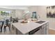 Contemporary kitchen with stainless steel dishwasher and island sink at 612 Terrapin Dr, Debary, FL 32713