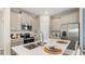 Bright kitchen with stainless steel appliances and quartz countertops at 612 Terrapin Dr, Debary, FL 32713