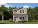 Charming two-story home with gray siding, covered porch, and well-manicured lawn at 614 Terrapin Dr, Debary, FL 32713