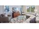 Bright living room with stylish decor, comfortable seating, and plenty of natural light at 614 Terrapin Dr, Debary, FL 32713