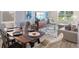 Stylish living room with comfortable seating, a dining area, and ample natural light at 614 Terrapin Dr, Debary, FL 32713