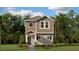 Charming two-story home with beautiful landscaping and a welcoming front entrance at 620 Terrapin Dr, Debary, FL 32713