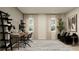 Versatile home office provides a workspace and seating area with a modern aesthetic at 698 Peroni Ave, Debary, FL 32713