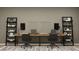 Functional home office provides two workstations, shelving, and organized storage solutions at 698 Peroni Ave, Debary, FL 32713