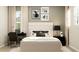Cozy bedroom boasts stylish décor, a comfortable bed, and a tranquil ambiance at 698 Peroni Ave, Debary, FL 32713
