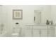 Clean and well-lit bathroom featuring modern fixtures, a spacious vanity, and a shower-tub combination at 703 Peroni Ave, Debary, FL 32713