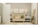 Charming Bedroom featuring a crib, side tables with lamps, and soft décor elements for a peaceful space at 703 Peroni Ave, Debary, FL 32713