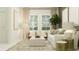 Inviting living room with neutral tones, comfortable seating, and natural light from the large windows at 703 Peroni Ave, Debary, FL 32713