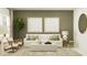 Cozy living room with neutral décor, comfortable seating, and stylish accents for a relaxing ambiance at 703 Peroni Ave, Debary, FL 32713