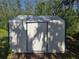 Exterior view of a storage shed in the backyard at 917 Adamson Ct, Lake Alfred, FL 33850
