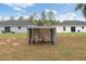 Backyard view of the detached houses and equipment at 14404 Sw 19Th Pl, Ocala, FL 34481