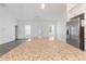 Kitchen featuring an open layout, granite countertops, stainless steel appliances, and hardwood flooring at 14404 Sw 19Th Pl, Ocala, FL 34481