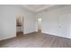 Bright main bedroom featuring a trey ceiling and two doors at 14404 Sw 19Th Pl, Ocala, FL 34481