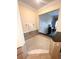 Bathroom with an adjacent view to the bedroom and a large soaking tub at 7673 Heritage Crossing Way # 202, Reunion, FL 34747