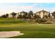 Picturesque golf course view with lush green fairways and manicured landscaping around luxury condominiums at 7673 Heritage Crossing Way # 202, Reunion, FL 34747