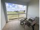 Enjoy the views from this patio with outdoor seating overlooking the lush green golf course at 7673 Heritage Crossing Way # 202, Reunion, FL 34747